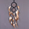 Dream catcher with brown feathers wall hanging